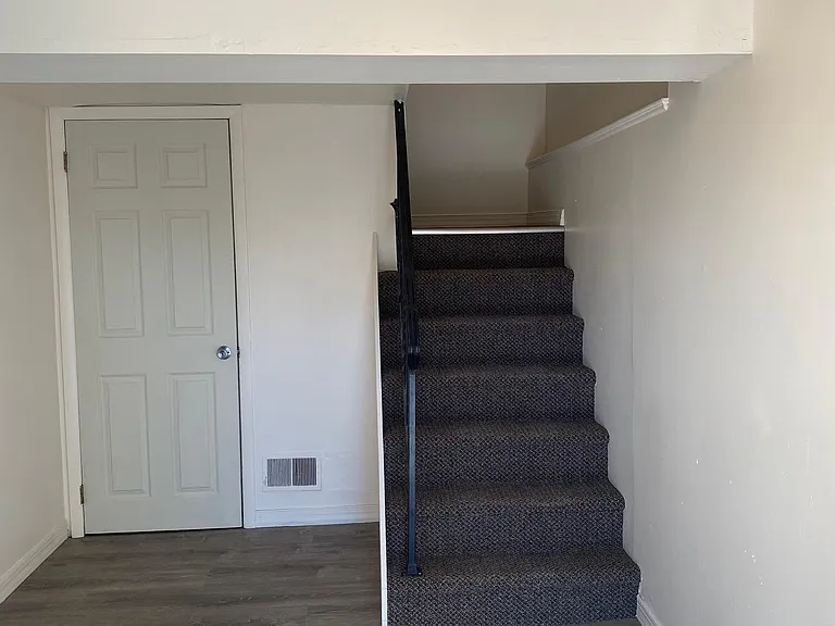 Front entrance. The Door to the left leads to the garage and laundry room.