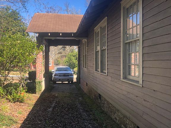 Covered parking in driveway.