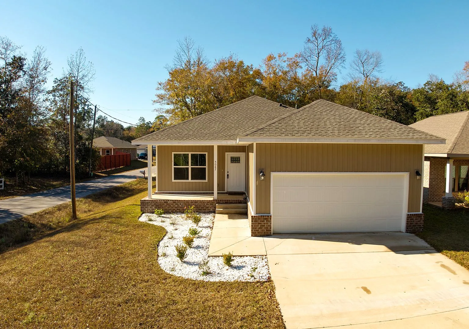 Welcome Home to Coastal Comfort in Milton! — Photo 1