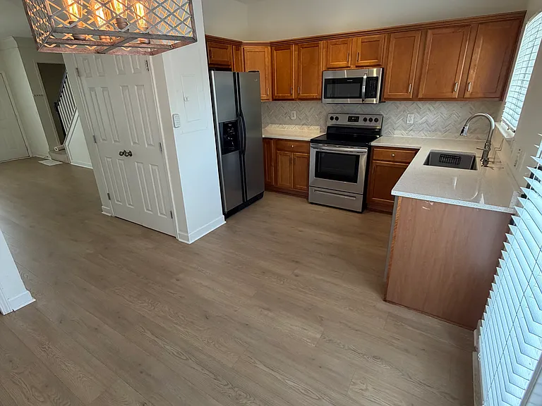 Your kitchen with stainless steel appliances.
