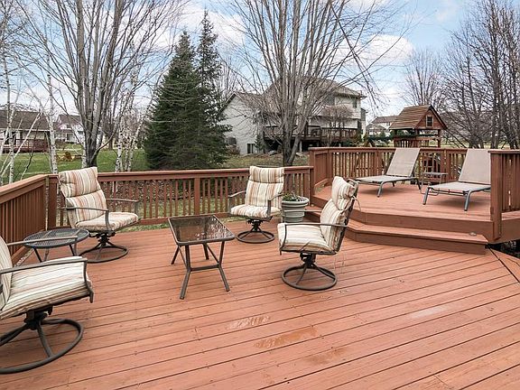 From the dining area, expand your living and entertaining space to the outdoors on this wonderful multi-level deck!
