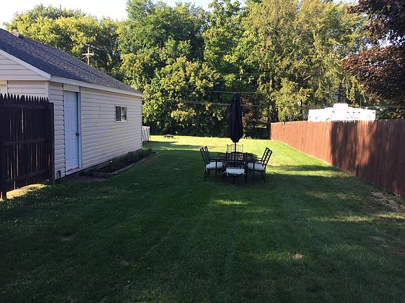 View from the small back porch. TONS of yard behind the garage.