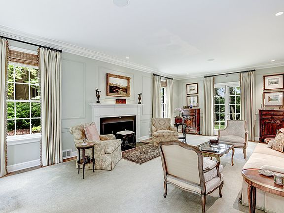 Living Room w/ wood-burning fireplace