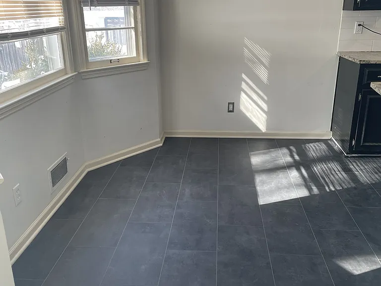 Eat-In kitchen has new luxury vinyl flooring.