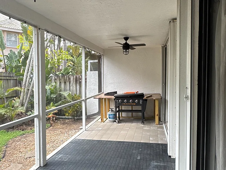 Back patio, comes with griddle and granite coutertop.