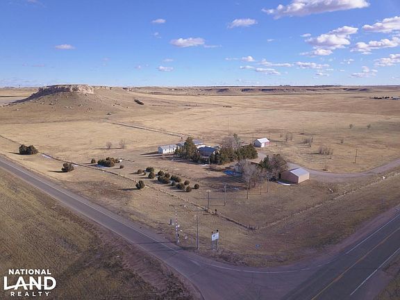 Sidney I-80 Pasture and Three Homes - 106.68 +/- acres