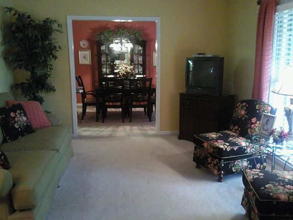 living room with view of dining room