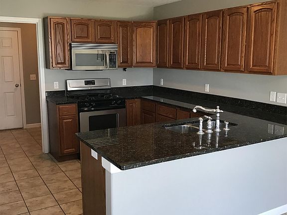 Kitchen with stainless steel appliances