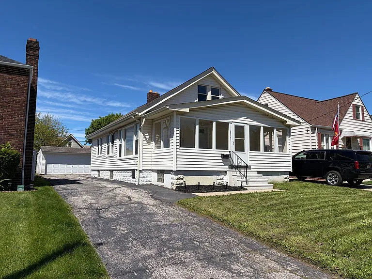 8221 Grand Division Ave — Photo 1