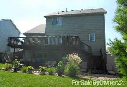 Spacious Backyard
						:
						Perfect for entertaining. Large deck, extended brick patio, hot tub, bar.