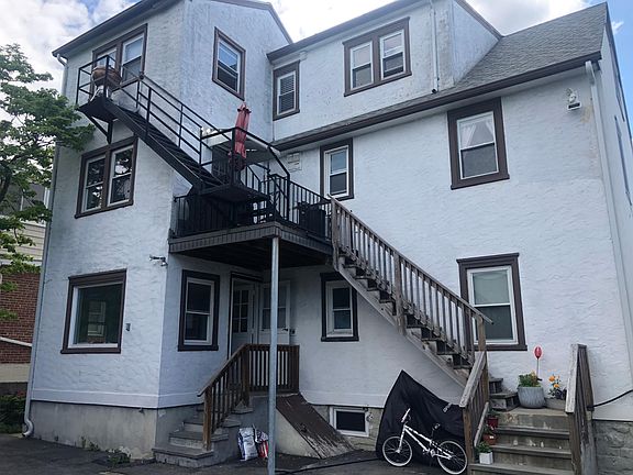 Back of house. Private entrance to unit 1