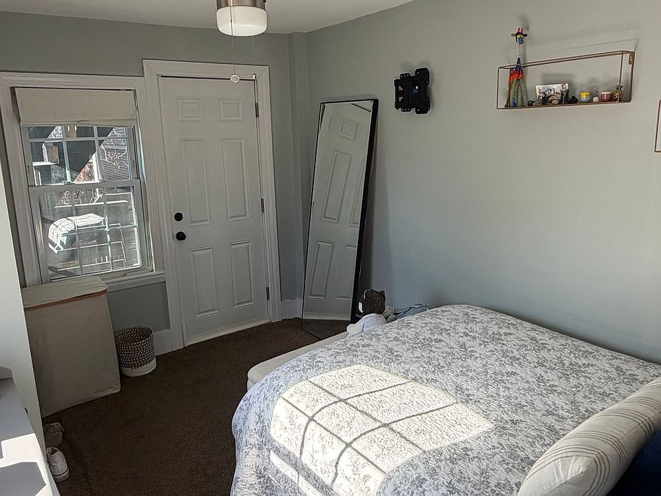 Queen size bed, closet, door to private deck
