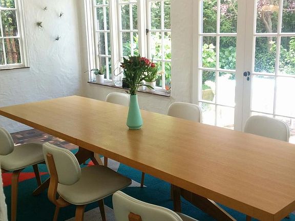 Bright dining area looking out into garden