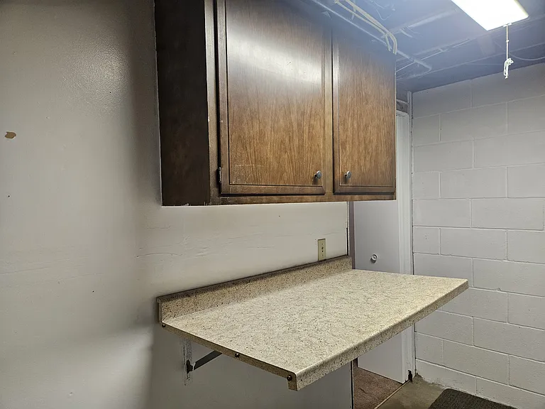 Folding table and storage in laundry room
