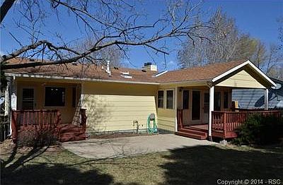 Exterior back of house, note 2 covered decks!
