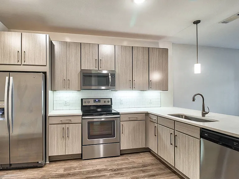 All homes come equipped with stainless steel appliances and tiled back-splashes