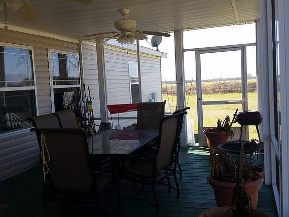 Large screened-in back porch