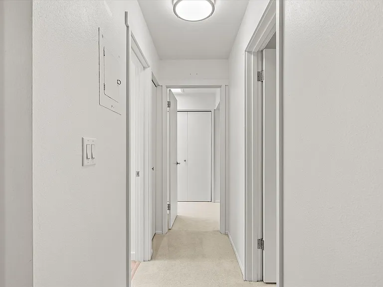 Hallway to bedrooms and bathrooms