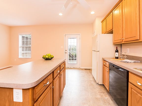 Kitchen has abundant counter and cabinet space