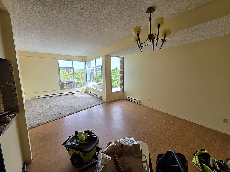 Dining room to the right and living room to the left
Kitchen hard left