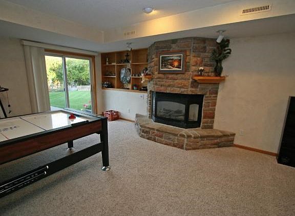 Large front porch overlooks fabulous cul-de-sac! Sit back, relax with your morning coffee and watch the kids and pets play!