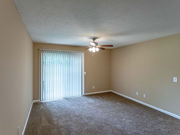 Bedroom with carpet