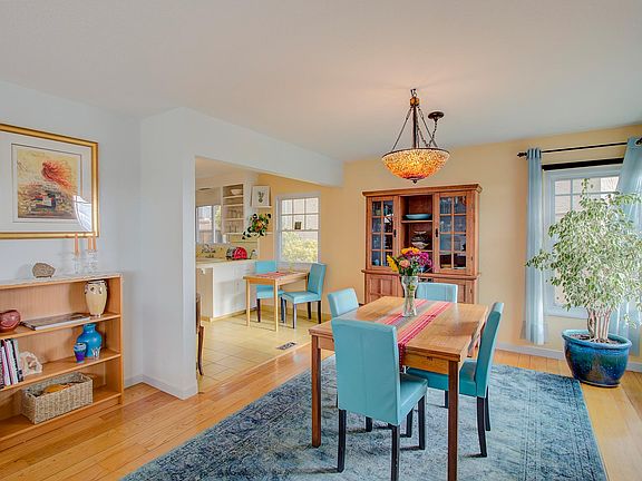 Dining room table has two built in leaves and can accommodate 10 people.