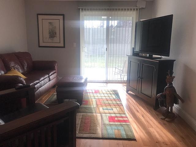 Living Area looking onto fenced back yard
