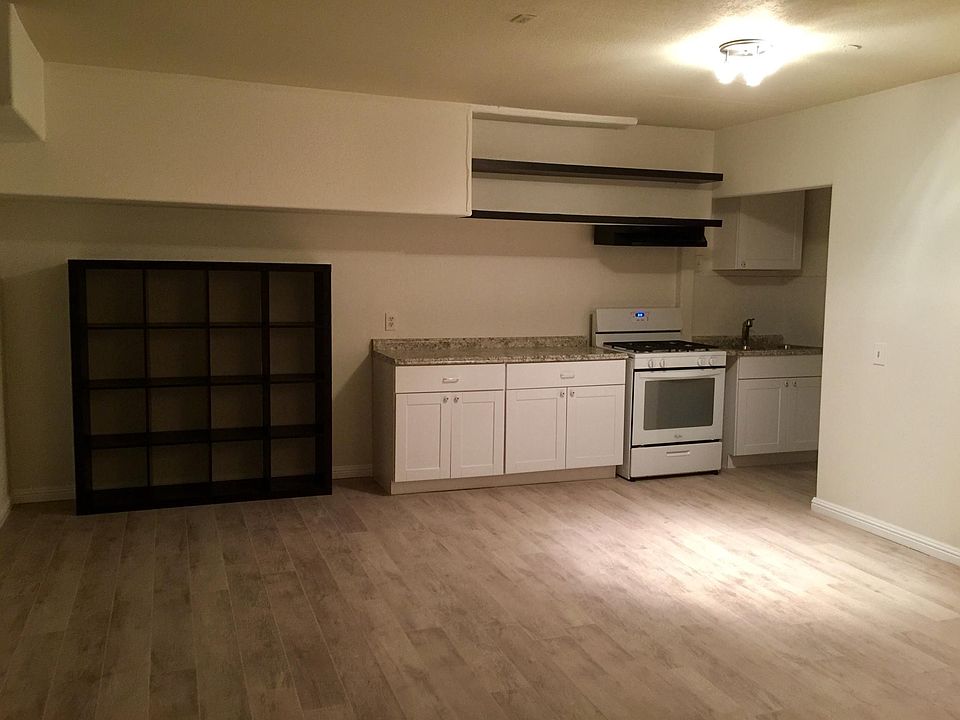 Lower Brand new appliances/cabinets/laminate floor