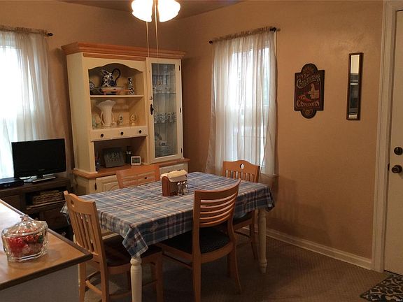 Off the living room is the breakfast room, which also features new carpet!