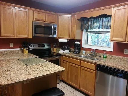 Kitchen upgraded with granite and stainless