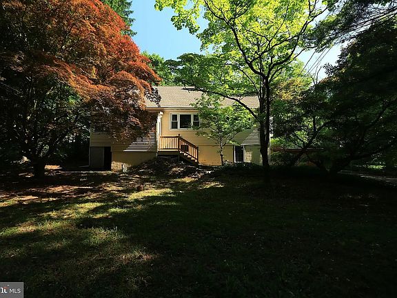 Beautiful, wooded yard offering a private, serene and tranquil living experience.