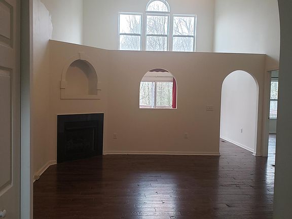 Living room with hard wood floors, gas fireplace