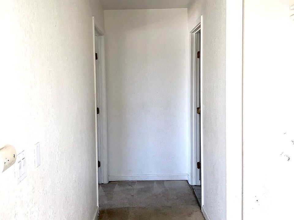 Hallway (Left side leads to bedroom, first right - kitchen opening, back right leads to bathroom)