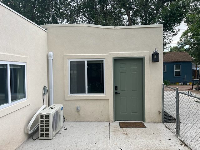 Entrance with private fenced patio