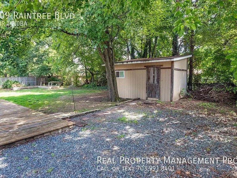 209 Raintree Blvd — Photo 48