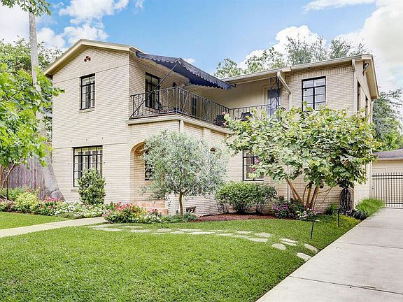 Modernized for today but retaining the original charm, this brick home welcomes you inside.