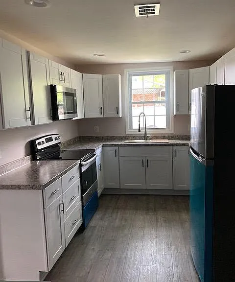 6438 Windham Ave — Photo 9
