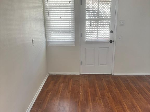 Kitchen nook with access to balcony.