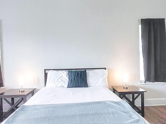 Bed with end tables and l