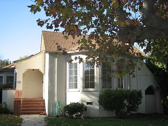 Classic vintage Burlingame house on a level, suburban street.