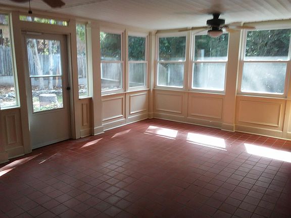 Large enclosed parch full of windows for great Light!