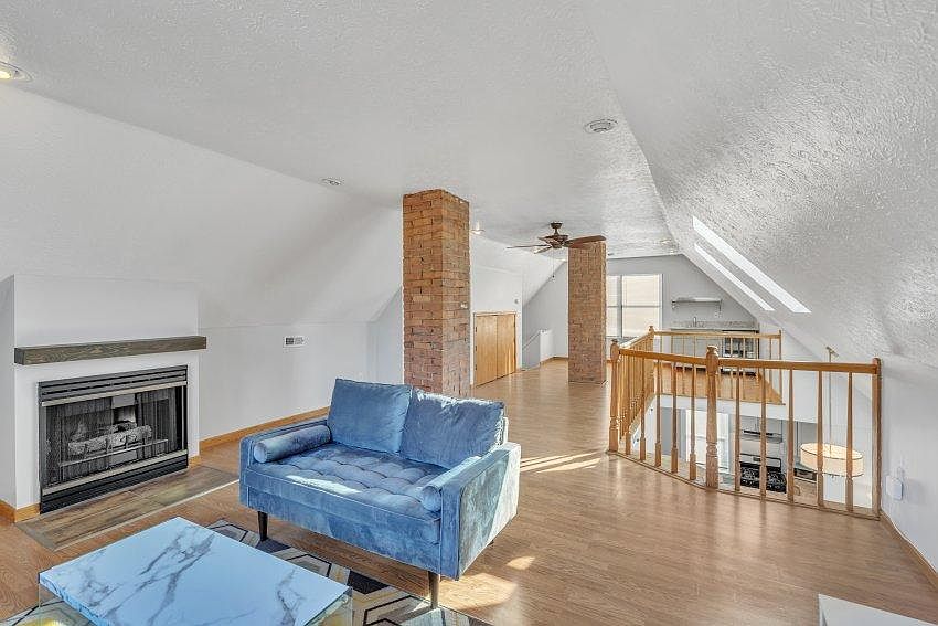 Livingroom loft area w/ fireplace