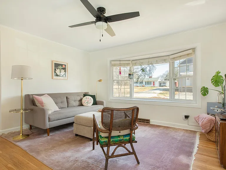 View of the living room showing large window.