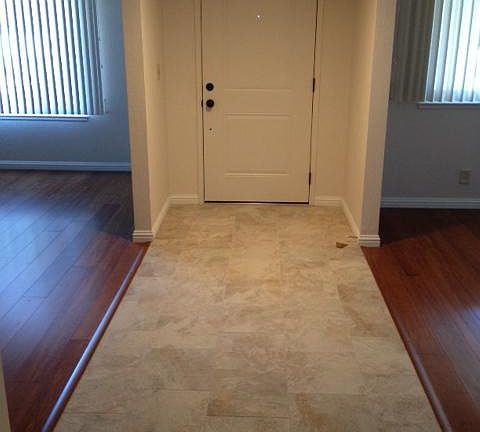 Tile entryway with formal living and dining rooms