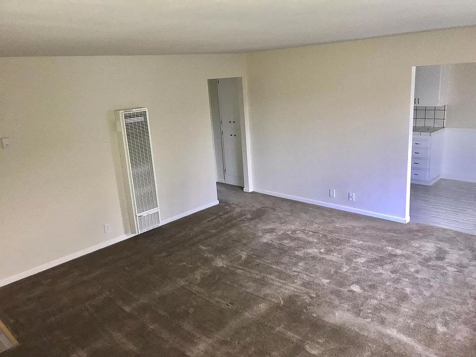 View of the living room entering the unit. Over 300 sq. feet of living space in the spacious living room.
