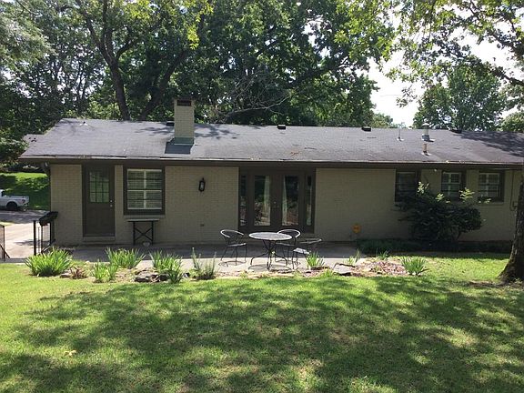 Large level fenced backyard