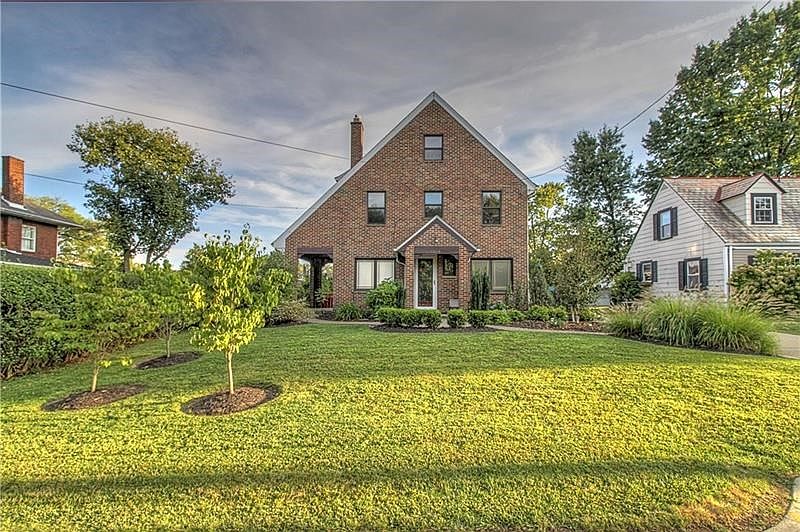 Full brick, 3 story brick in the heart of Patterson Heights.  Low exterior maintenance. Offers professional landscaping with exq