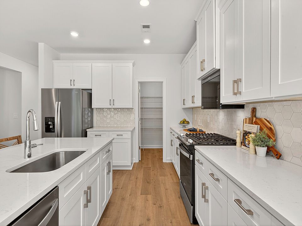 Kitchen in the Sherwood floorplan at a Meritage Homes community in Charlotte, NC.