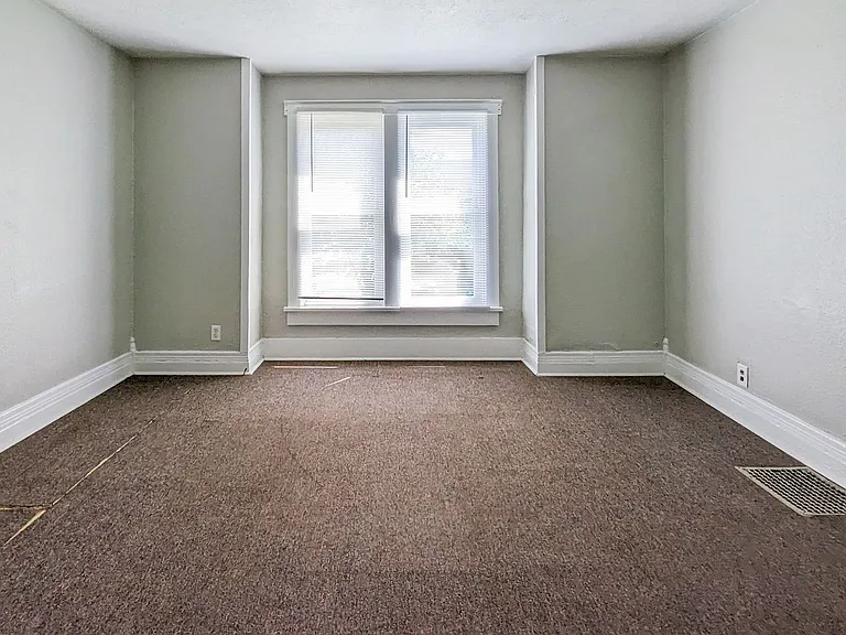 303 N Tillotson Ave — Photo 1
